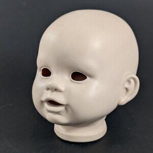 Vintage "Reproduction of Patches" Baby doll head by Boots Tyner 1987